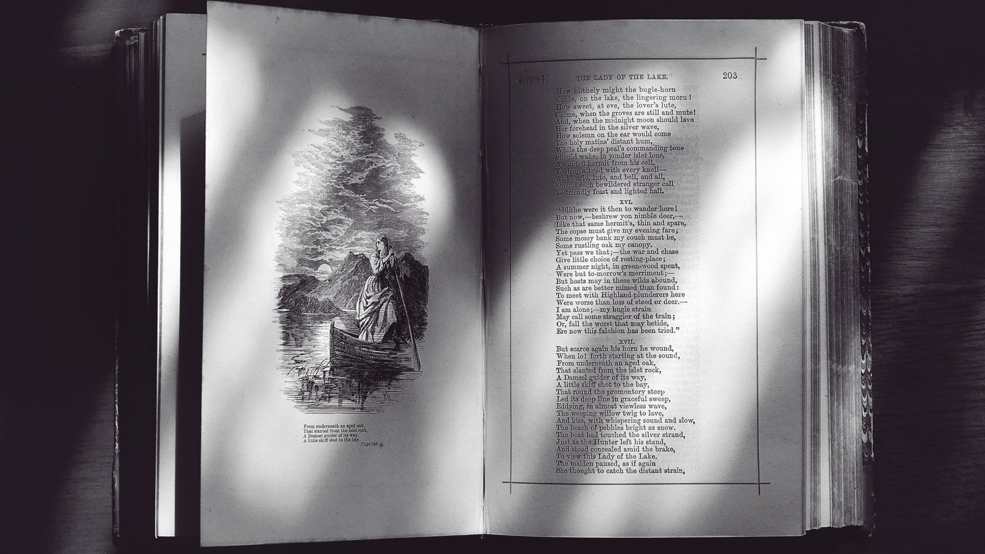 Aufgeschlagenes altes Gedichtbuch mit Illustration
